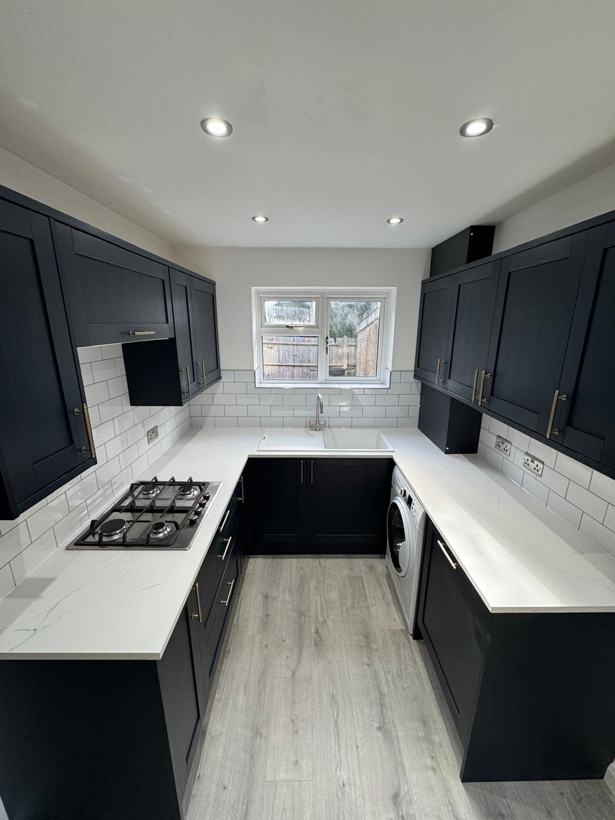 A marble-island kitchen by BKE Installations